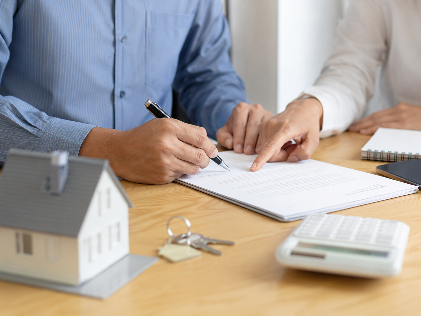 Firma de un acuerdo inmobiliario